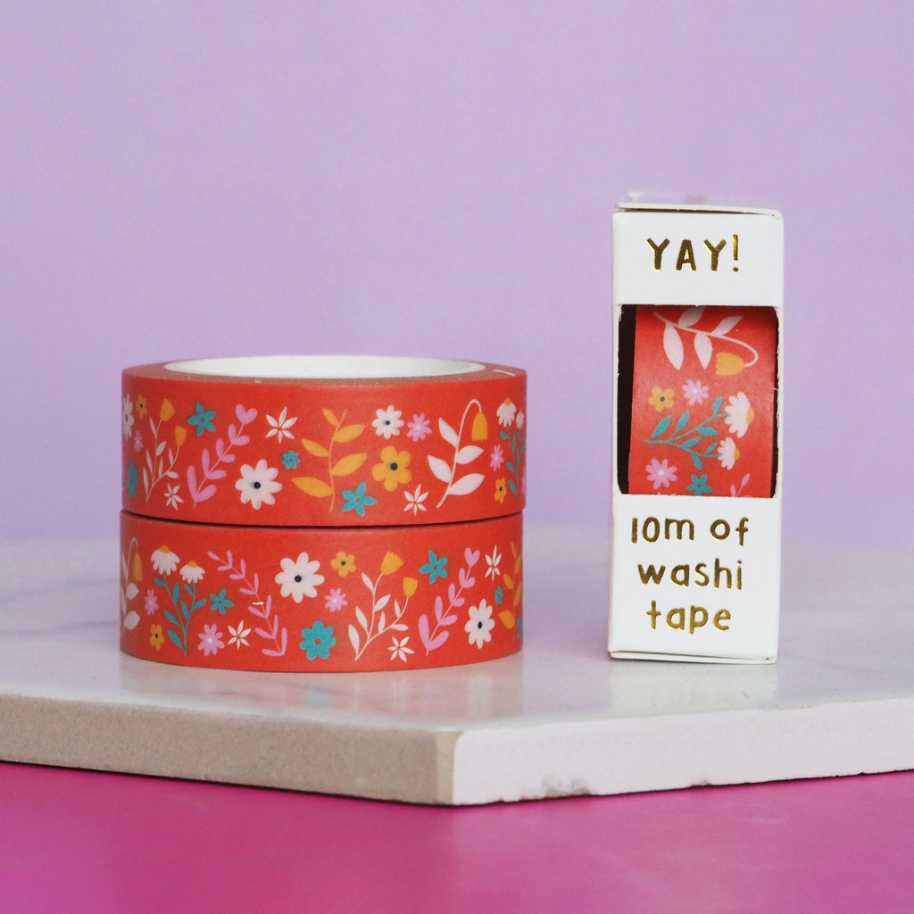Red orange floral flowery washi tape stacked on a marble tile - nutmeg and arlo