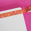 Red orange flowery floral washi tape on a bullet journal - nutmeg and arlo
