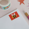 Postage stamp bee washi tape on an envelope - nutmeg and arlo
