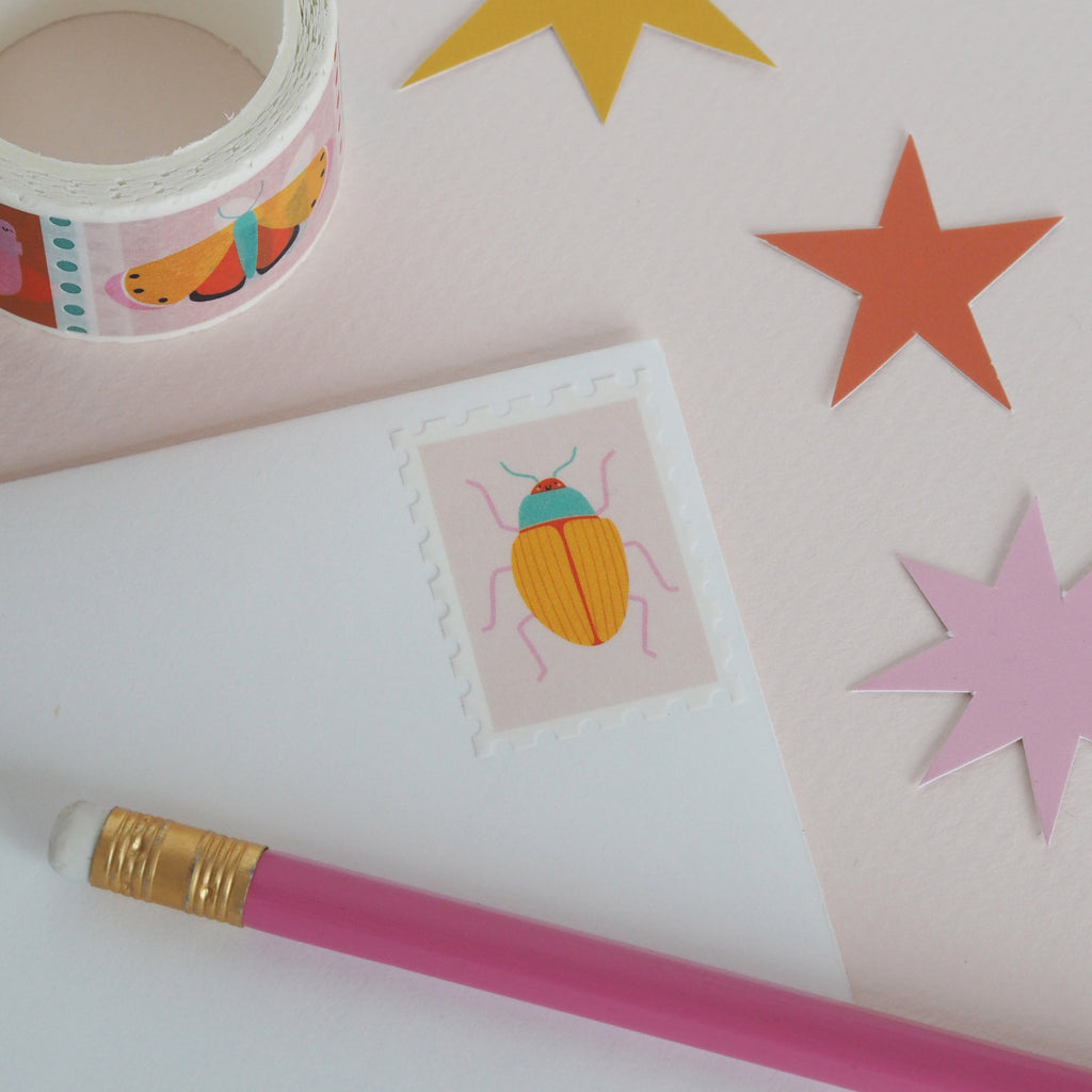 Postage stamp beetle washi tape on an envelope - nutmeg and arlo